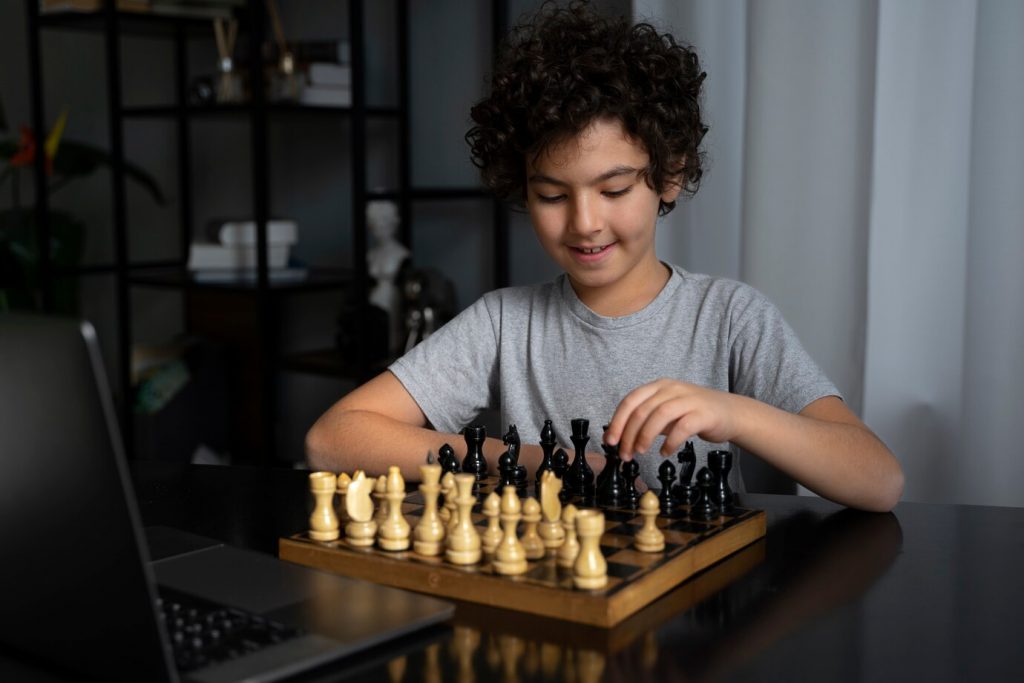 image of playing online chess games with computer